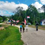 Satgas Yonif 623 Bersama Warga Merah Putihkan Jalan Kampung Bori di Papua