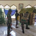 Personel Satgas Yonif 611/Awang Long, Pos Nayaro Melaksanakan Karya Bakti Menyambut Natal