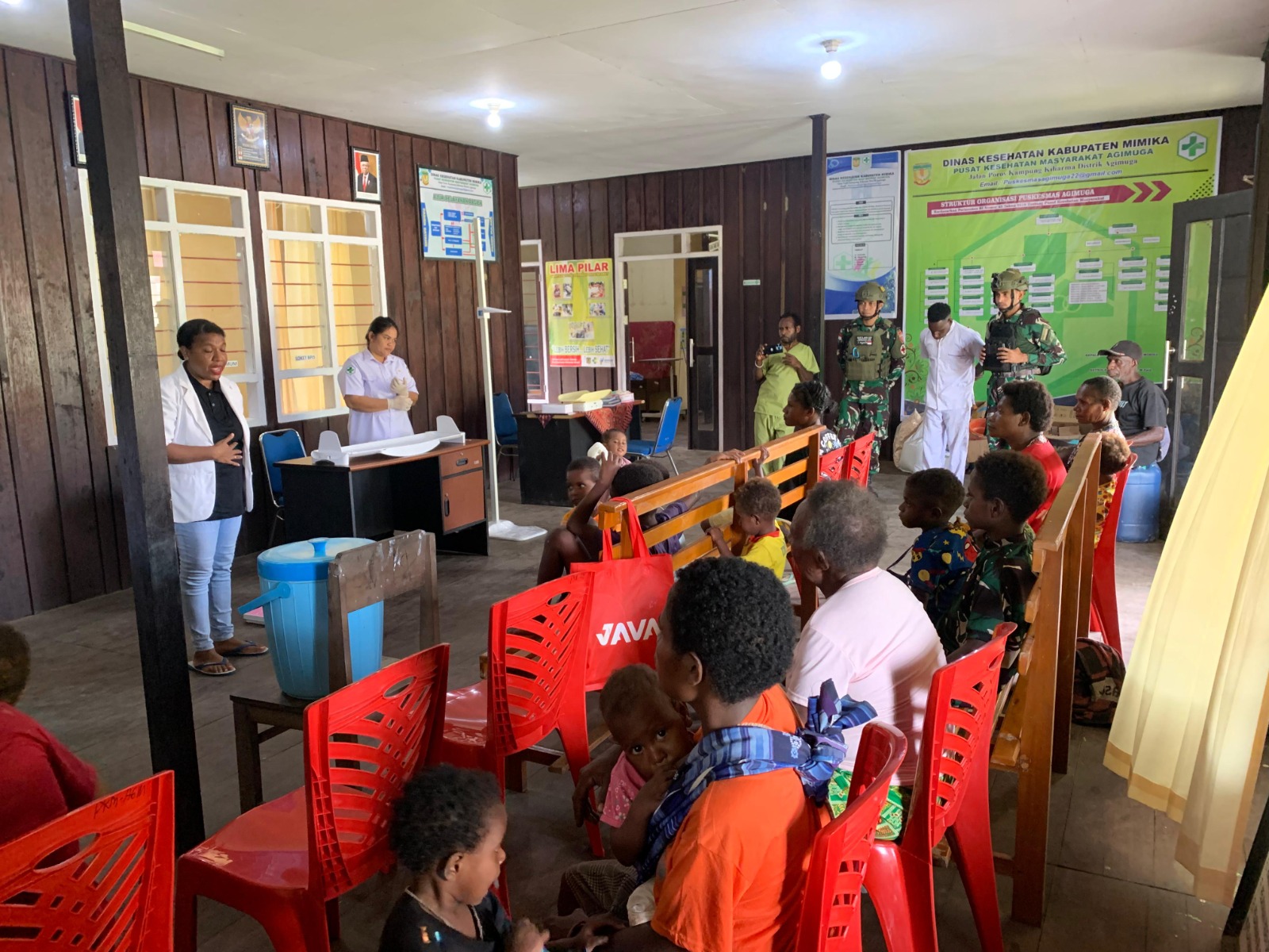 Dukung Program Pemerintah, Satgas Pam Obvitnas Yonif 611/ Awang Menggelar Layanan Kesehatan Posyandu di Distrik Agimuga