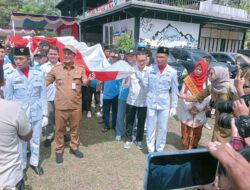 Semarak HKPN 2026, Munas SWI Nasional Dibuka Dirjen Kemendes PDT RI dengan Pembentangan Bendera Merah Putih 1 Kilometer