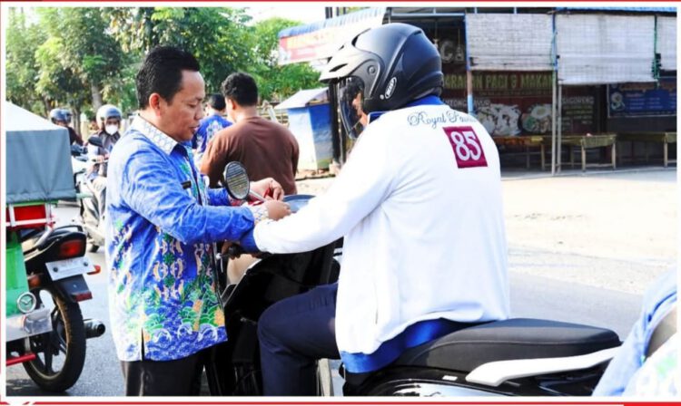 BKPP Labuhanbatu Bagikan 100 Bendera Merah Putih, Kobarkan Semangat Kemerdekaan di Tengah Masyarakat